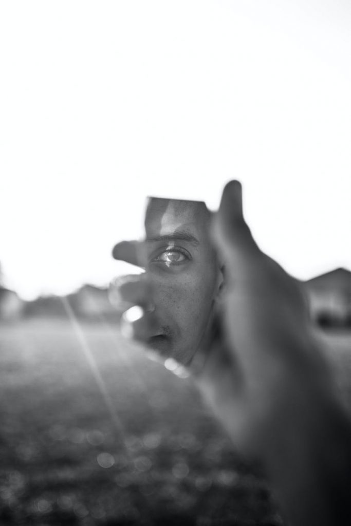 grayscale photo of human hand
